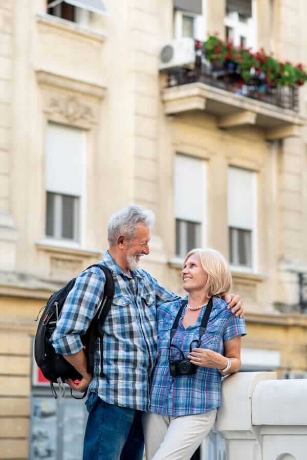 retirement planning options so couples can travel picture of senior couple traveling
